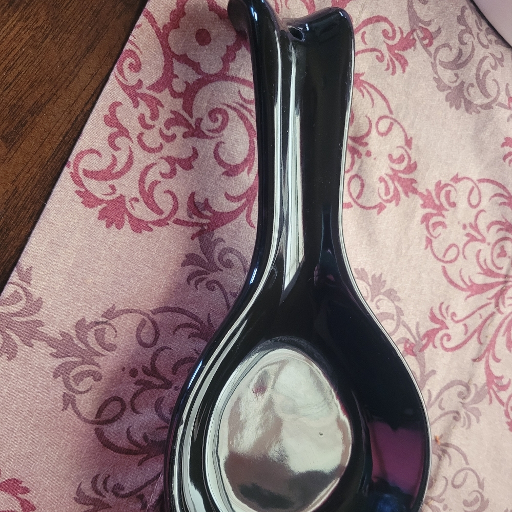 Glass spoon thing